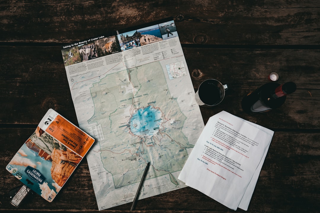 white map near mug, Planning the day at Crater Lake National Park