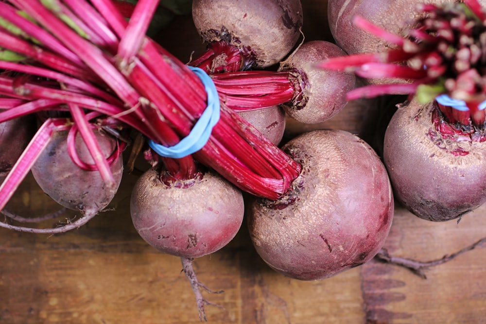 turnips on brown wooden surface