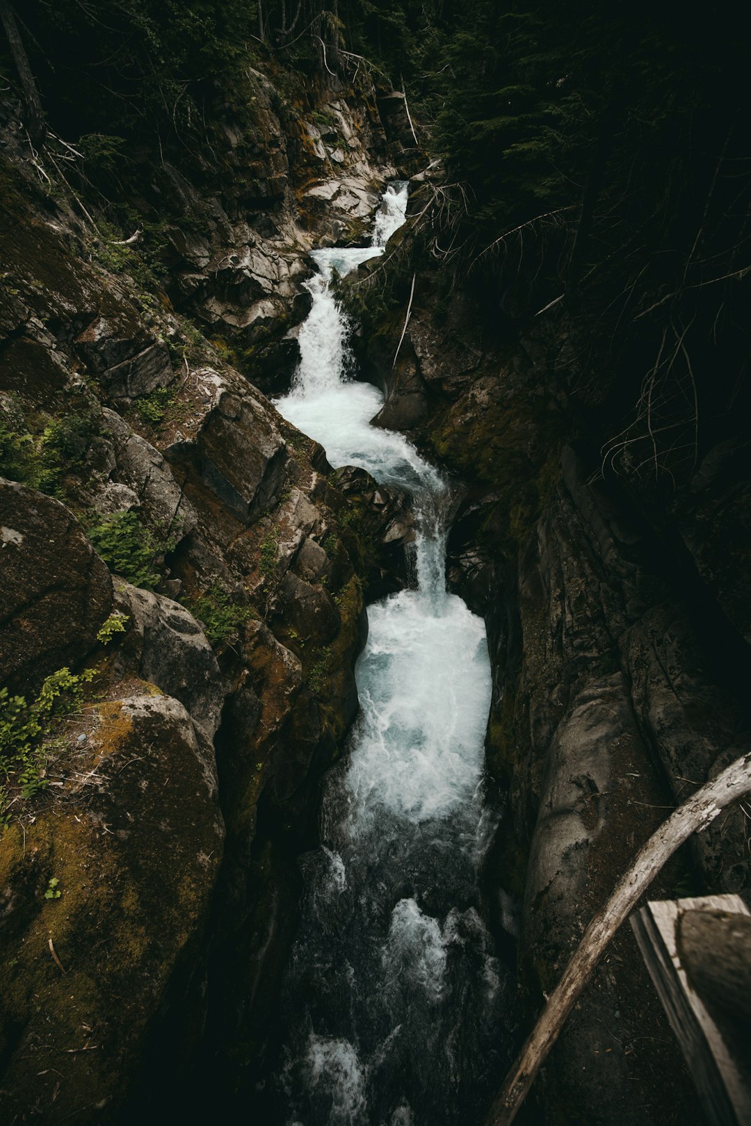 waterfalls between rock mountains