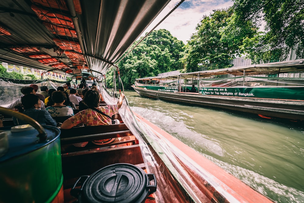 people riding on boat