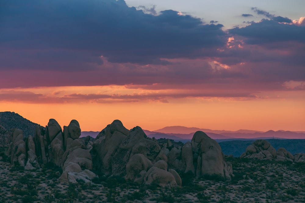 rock formation under cloudy daytime