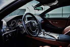 black BMW steering wheel with airbag cover