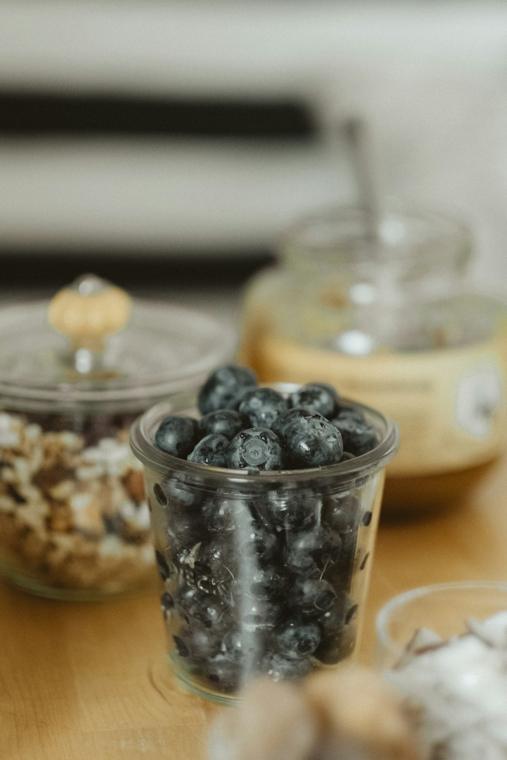 black berries with cup