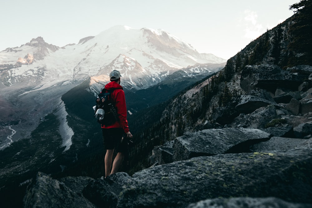 man standing on cliff