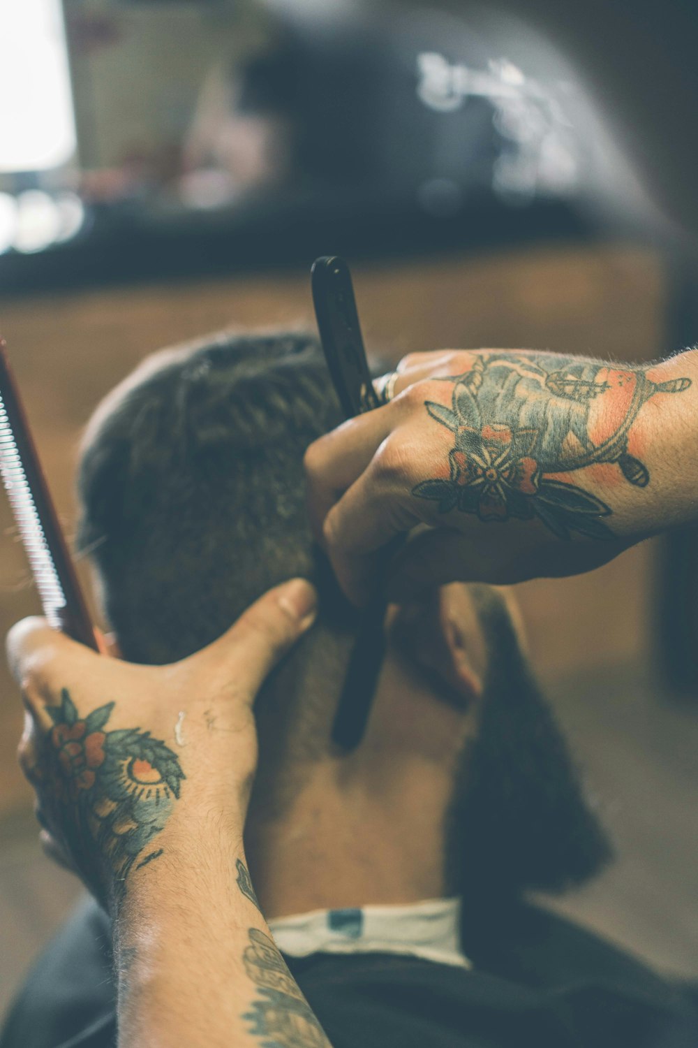 person shaving hair