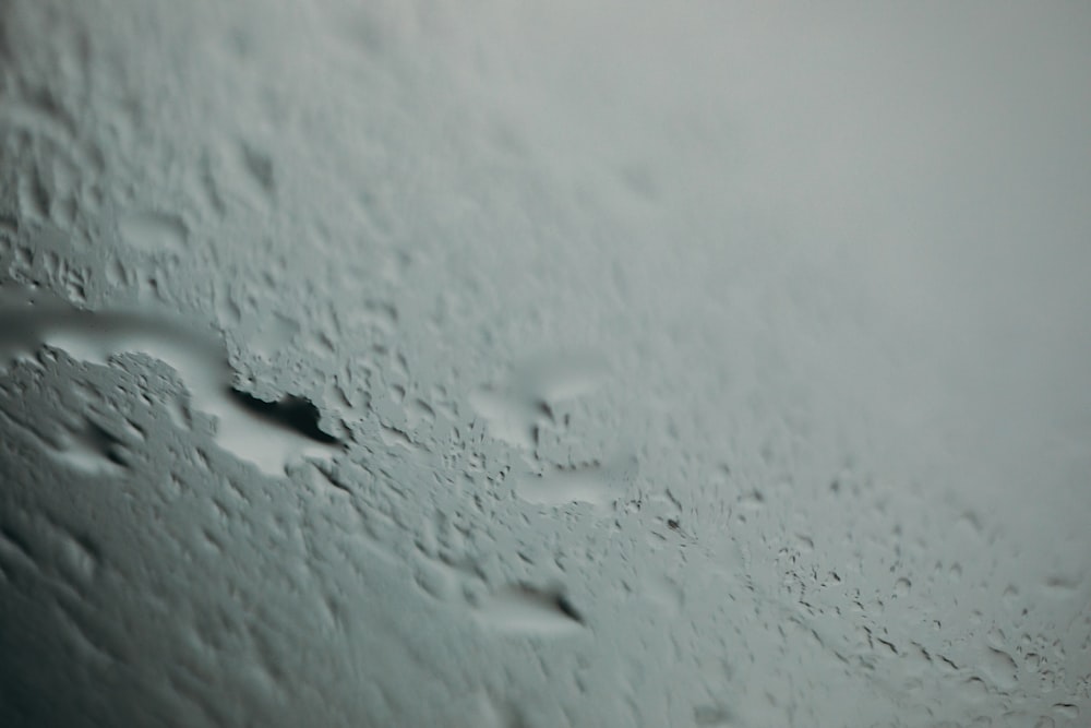 rain drops on the windshield of a car