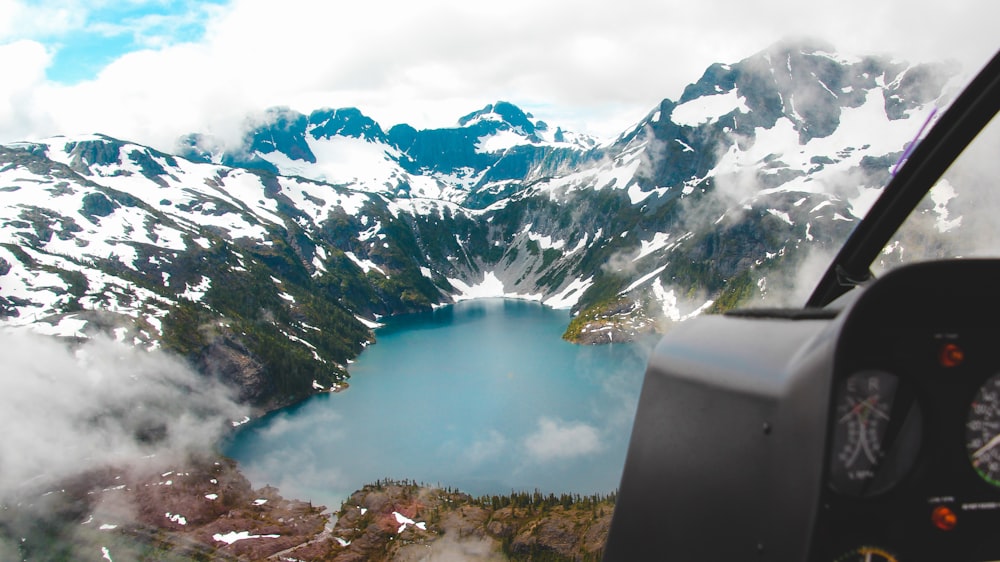 body of water surrounded by mountains