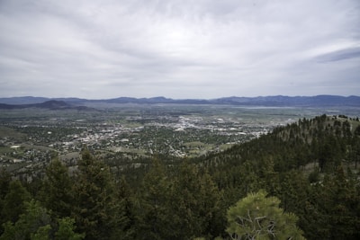 A panoramic view of a hillside property.