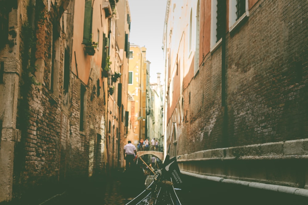 man walking on alley