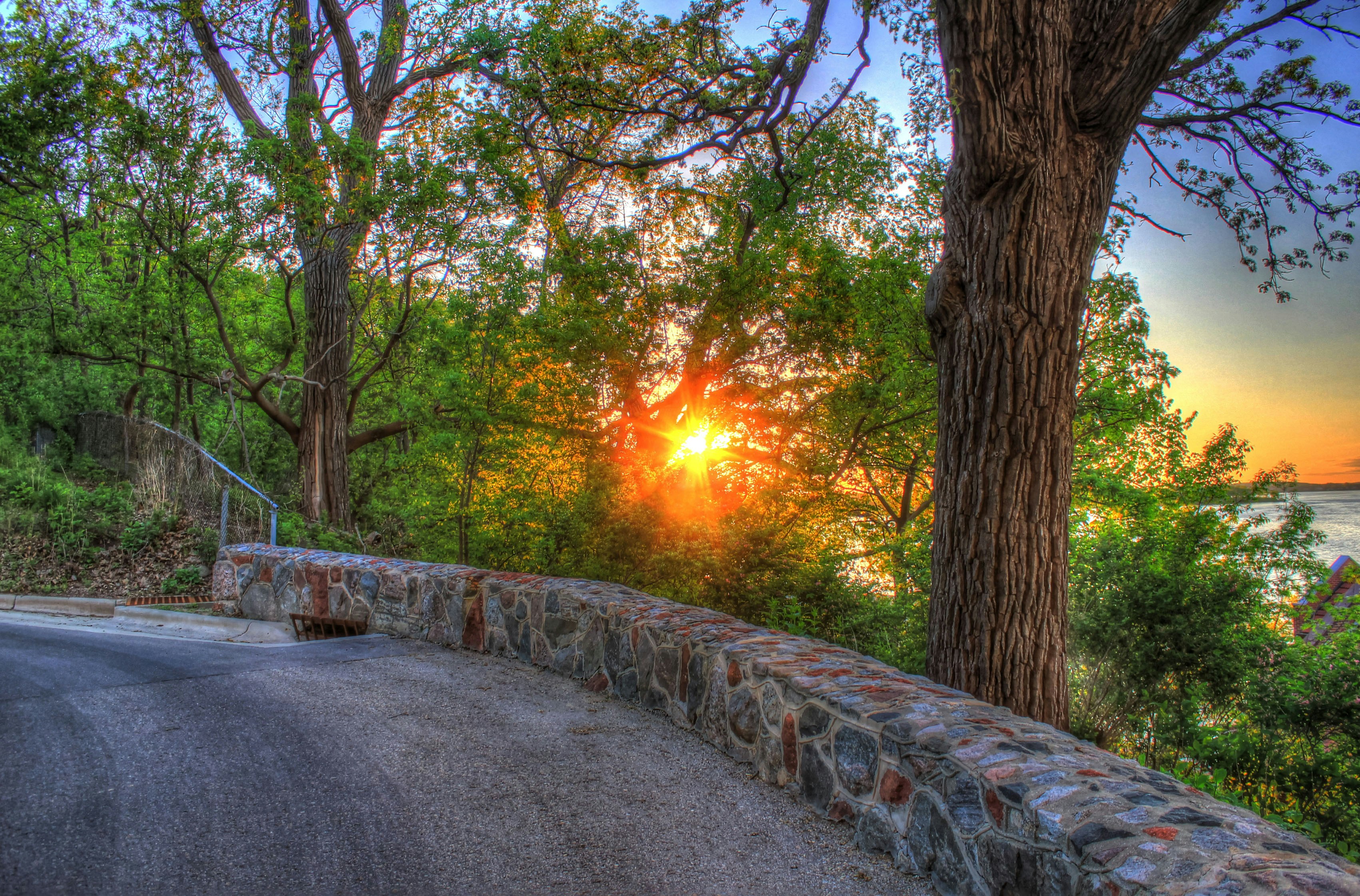 Sunset over Lake Mendota from the side road. If you use this photo, please consider crediting https://www.goodfreephotos.com , not required, but much appreciated.