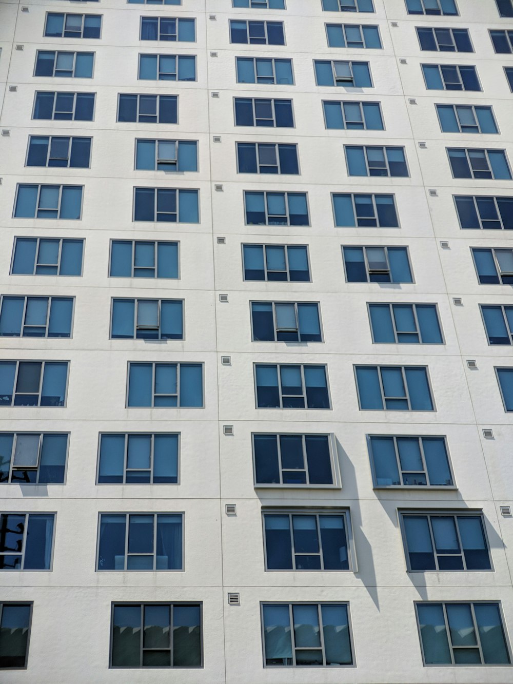 ground shot of white concrete building