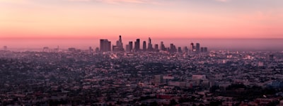 landscape photo of city buildings during dusk dodgers google meet background