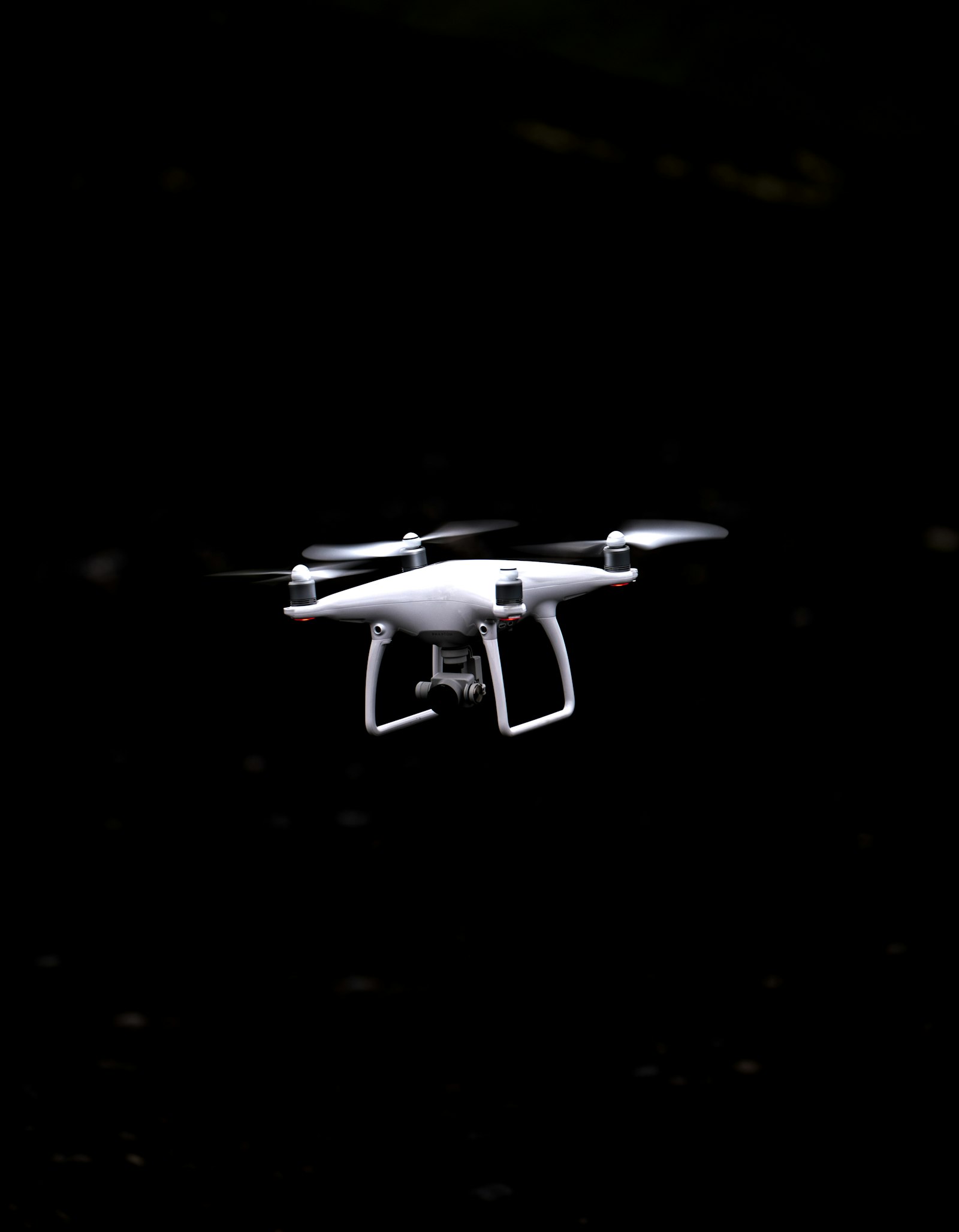 Canon EOS 5D Mark IV + Canon EF 70-300mm F4-5.6L IS USM sample photo. White and black quadcopter photography