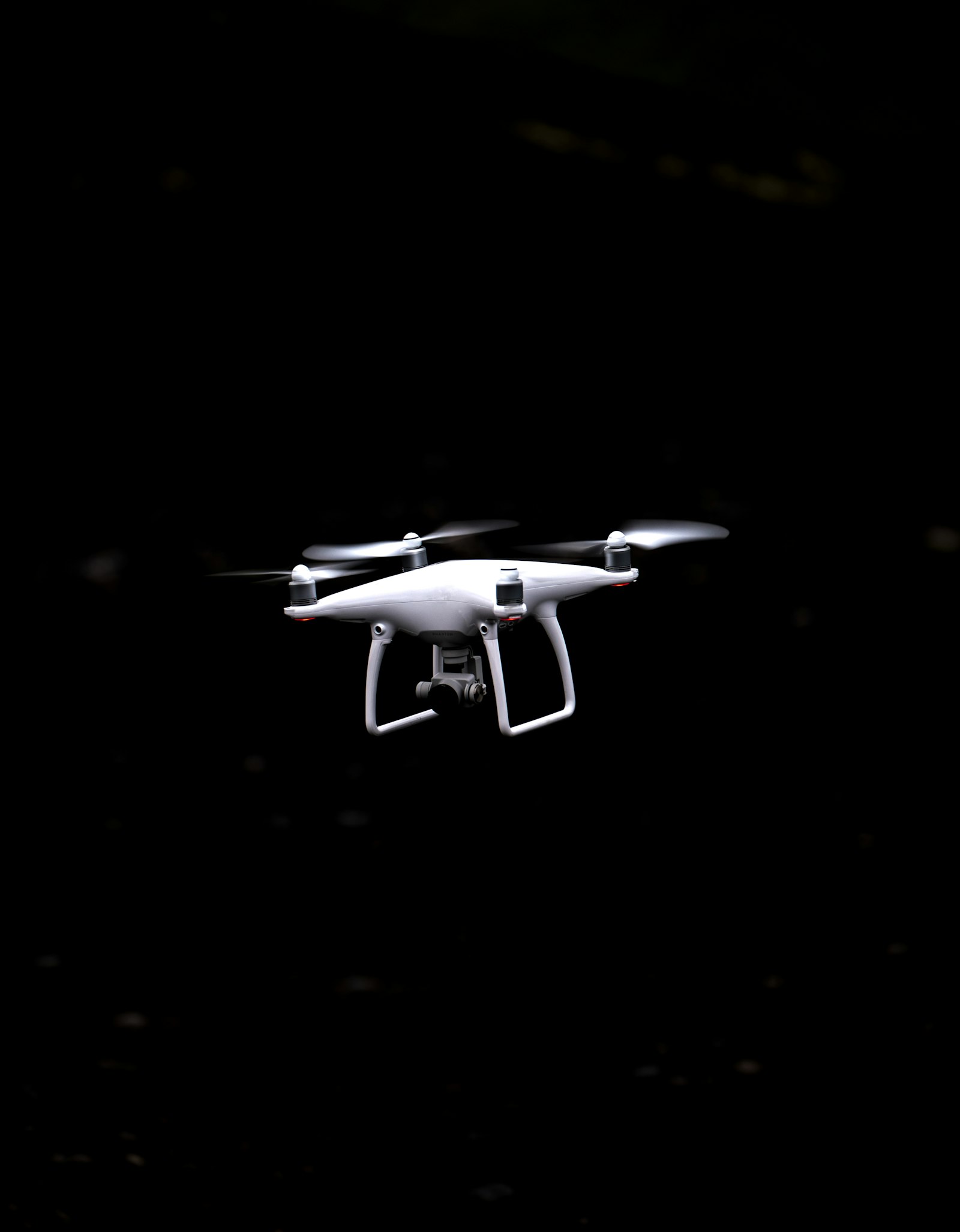 Canon EF 70-300mm F4-5.6L IS USM sample photo. White and black quadcopter photography