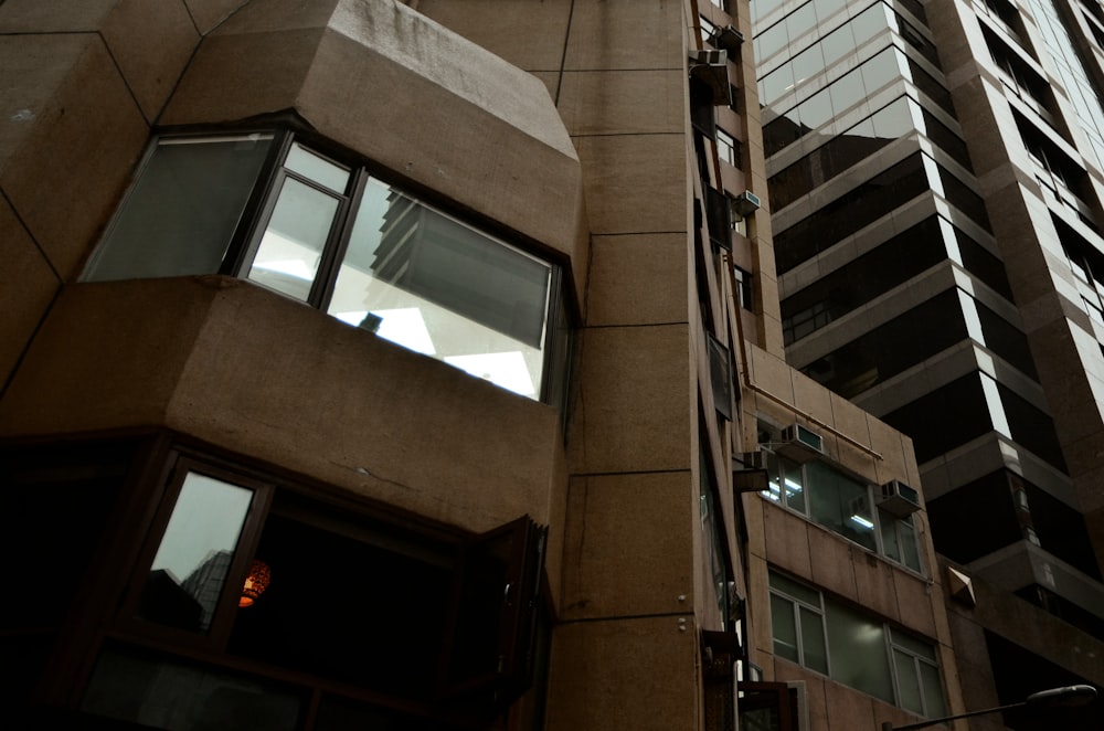 low-angle photo of brown building