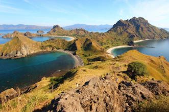 birds eye view of body of water and island