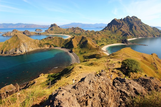 birds eye view of body of water and island in Komodo National Park Indonesia