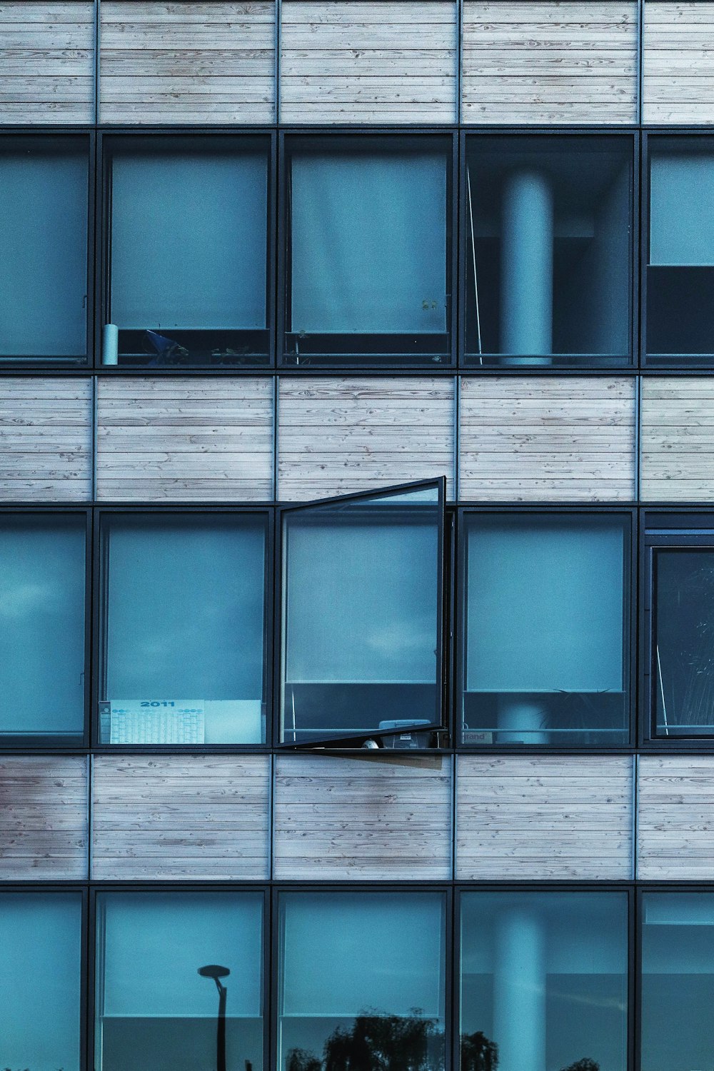 black wooden framed glass panel