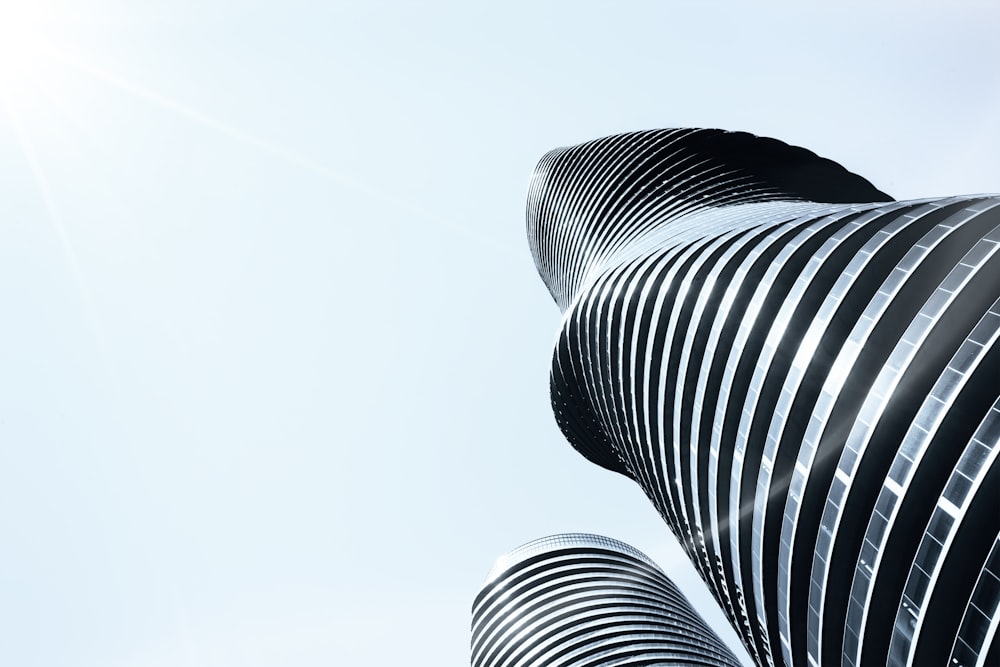 worms eye view of gray concrete building during daytime