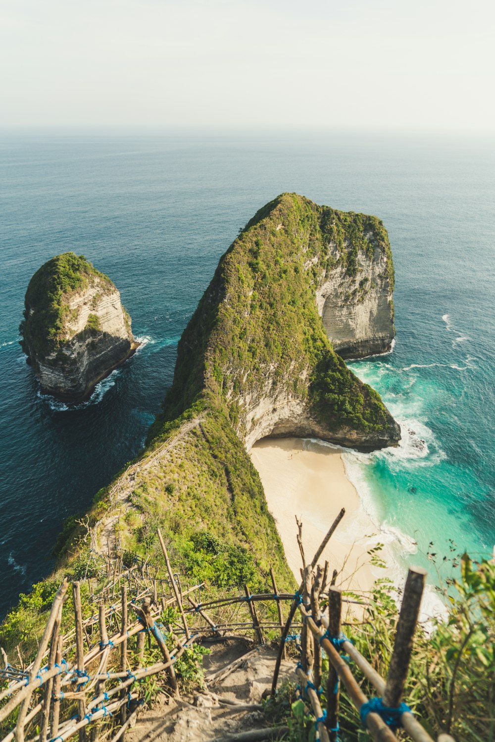 cliff beside body of water