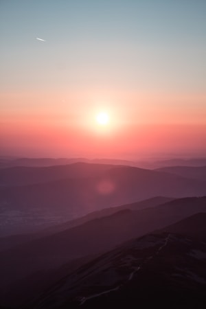 depth with layers in composition,how to photograph lost for words; aerial view of mountain during golden hour