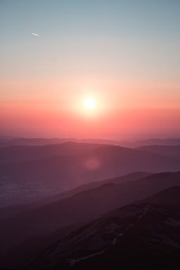 depth with layering for photo composition,how to photograph lost for words; aerial view of mountain during golden hour