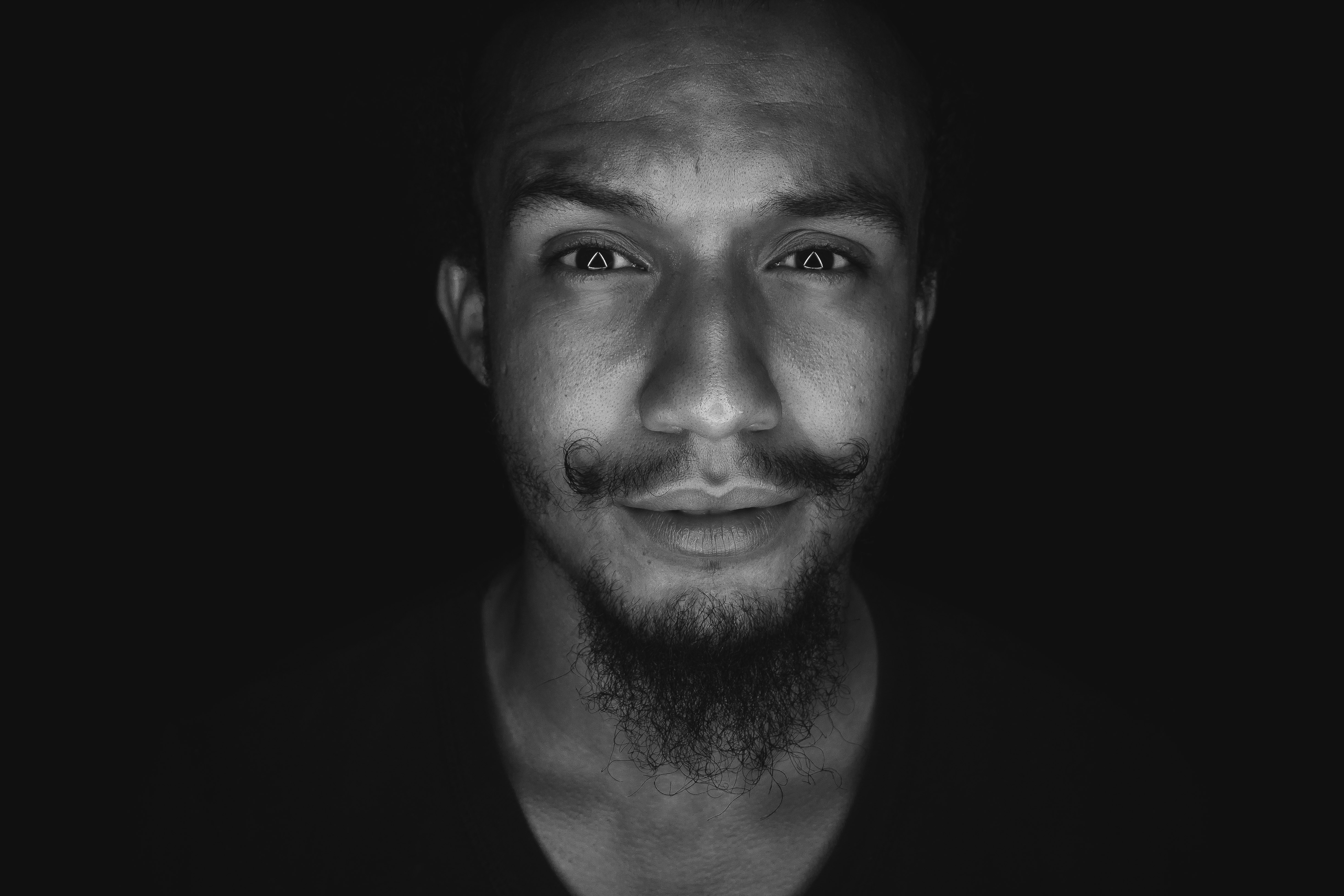 grayscale photo of man in shirt