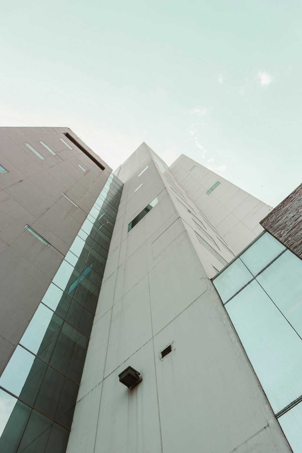 low angle photography of white building