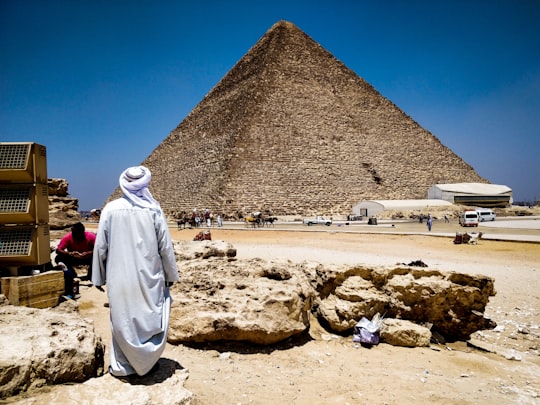 man looking at Pyramid of Giza in Great Pyramid of Giza Egypt