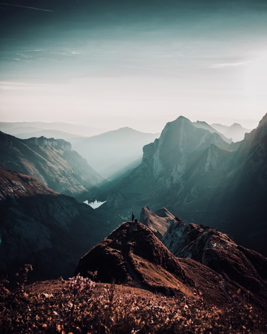 mountain rage view under cloudy sky during daytime in Berggasthaus Rotsteinpass Switzerland