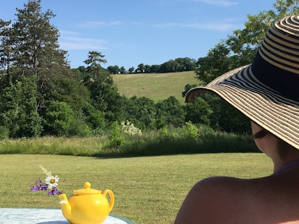 yellow ceramic teapot on table outdoor