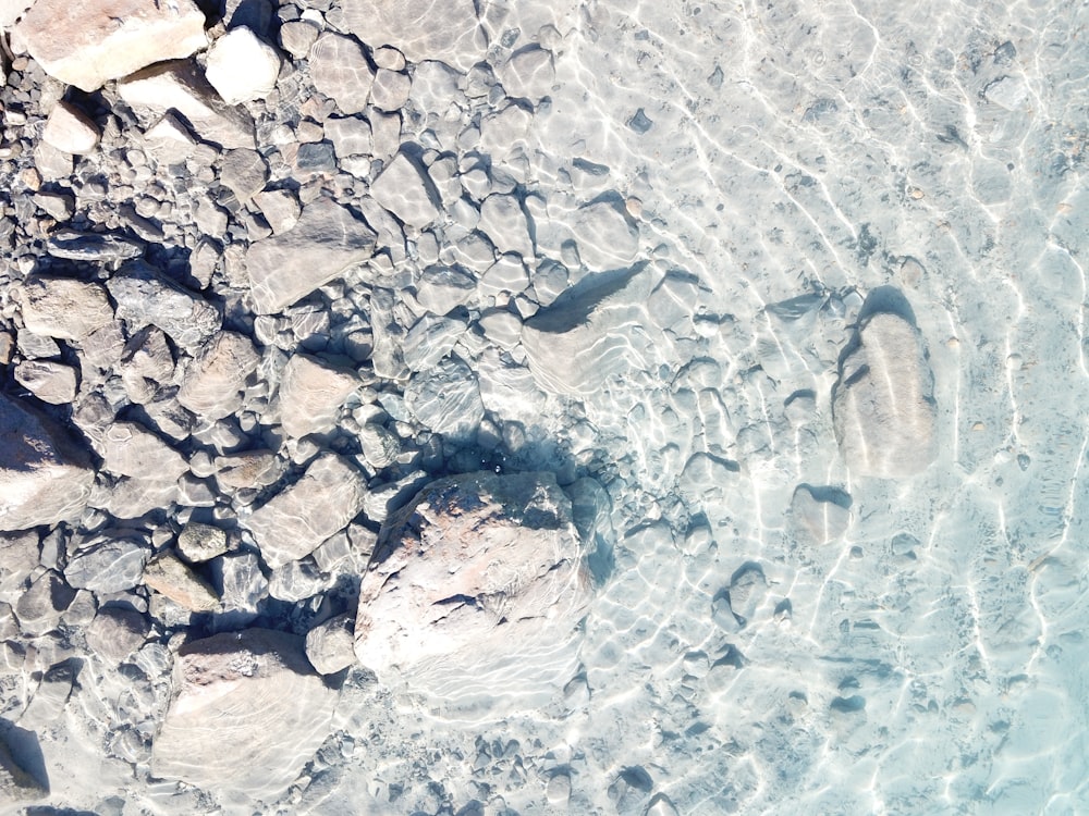 rocks on body of water