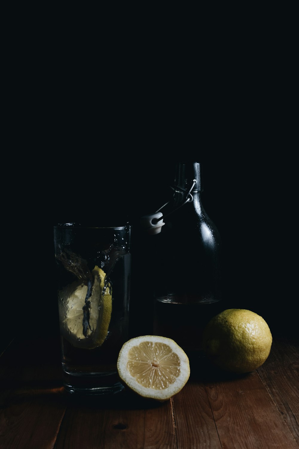 sliced lemons on wooden surface