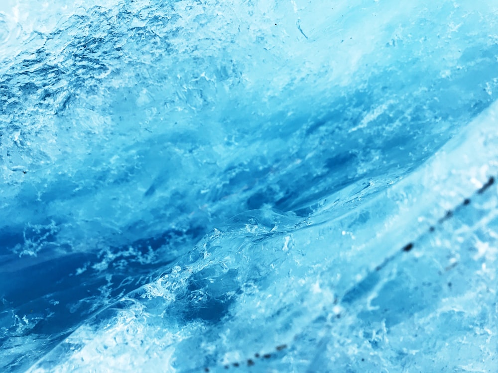 a close up of a wave in the ocean