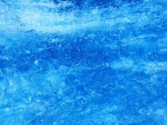 a close up of a blue water surface