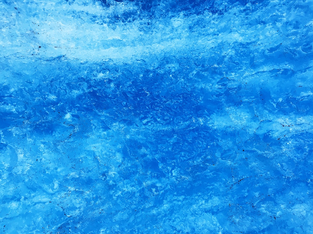 a close up of a blue water surface