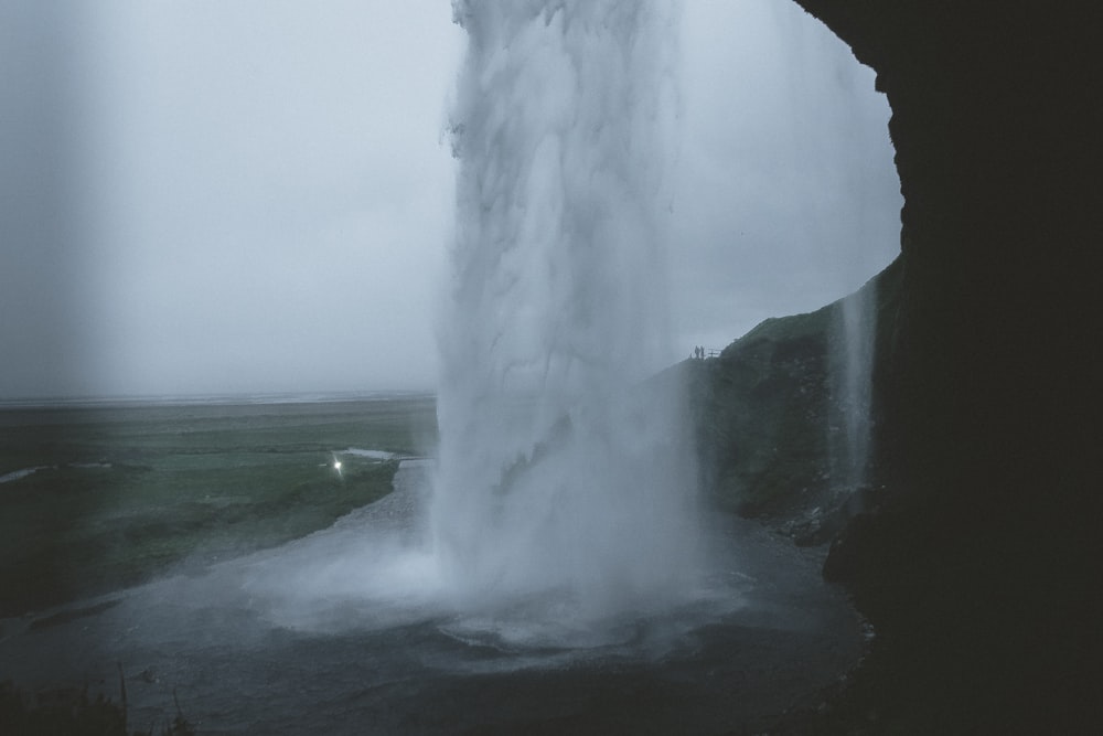 waterfall cave during day time