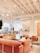 A cozy business reception area with warm lighting and comfortable seating.