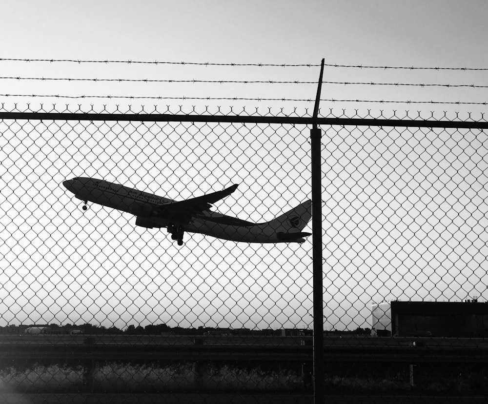 airplane taking off during daytime