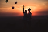 Couple sharing a special moment during a sunset balloon ride