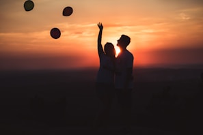 Couple sharing a special moment during a sunset balloon ride
