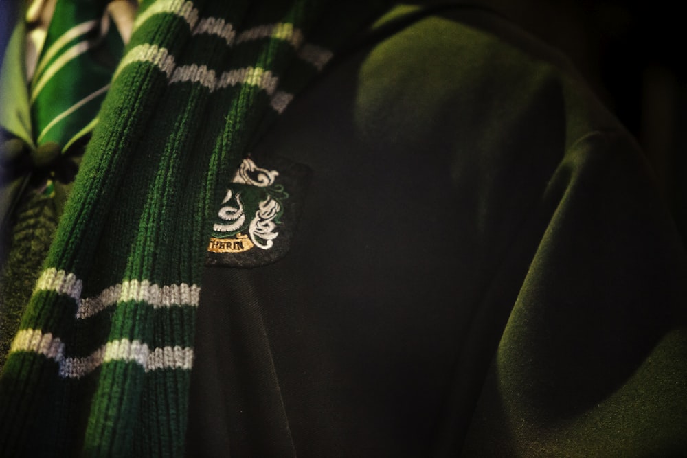 close photo of green and white scarf