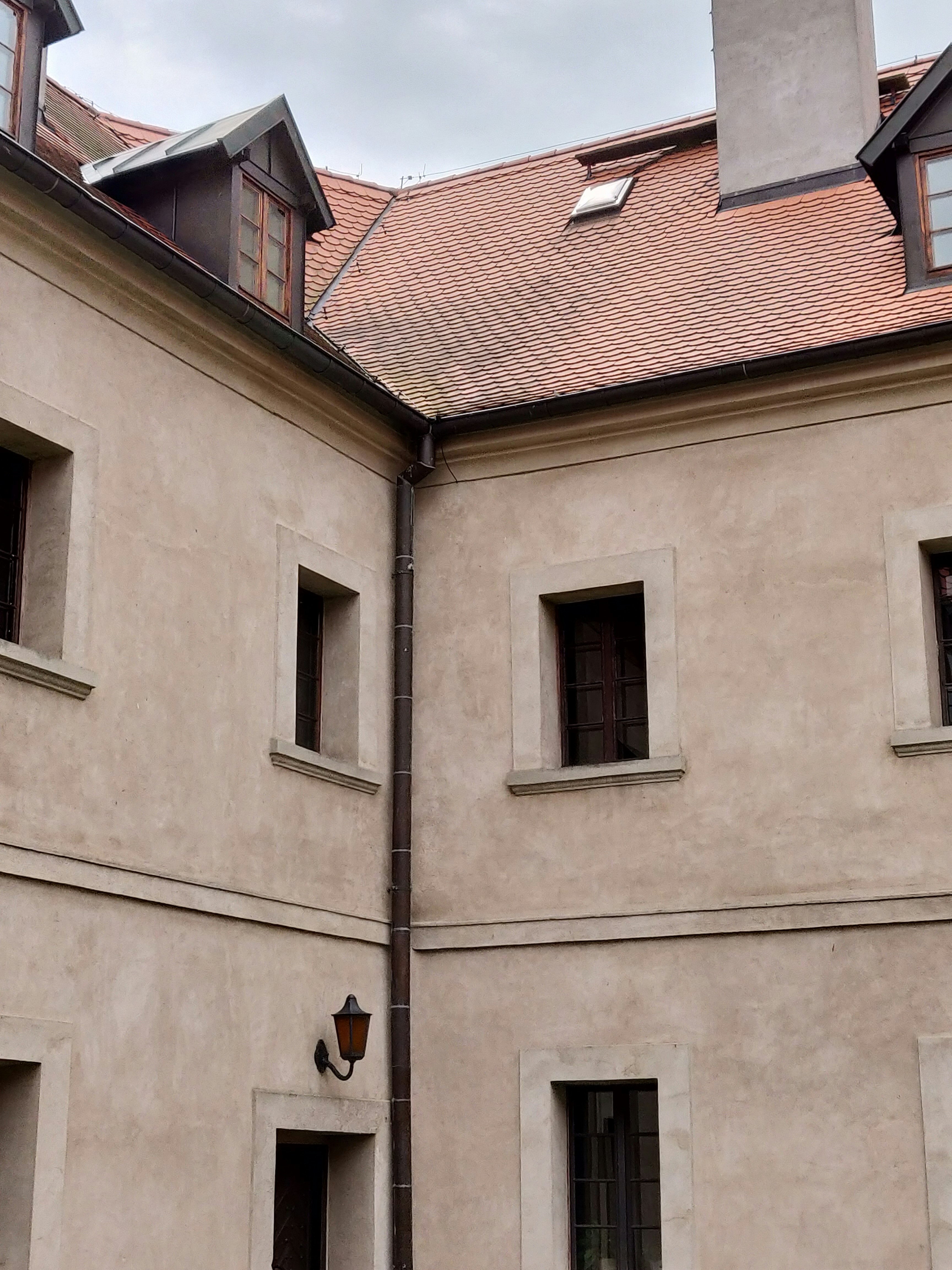 beige concrete 2-storey building during daytime