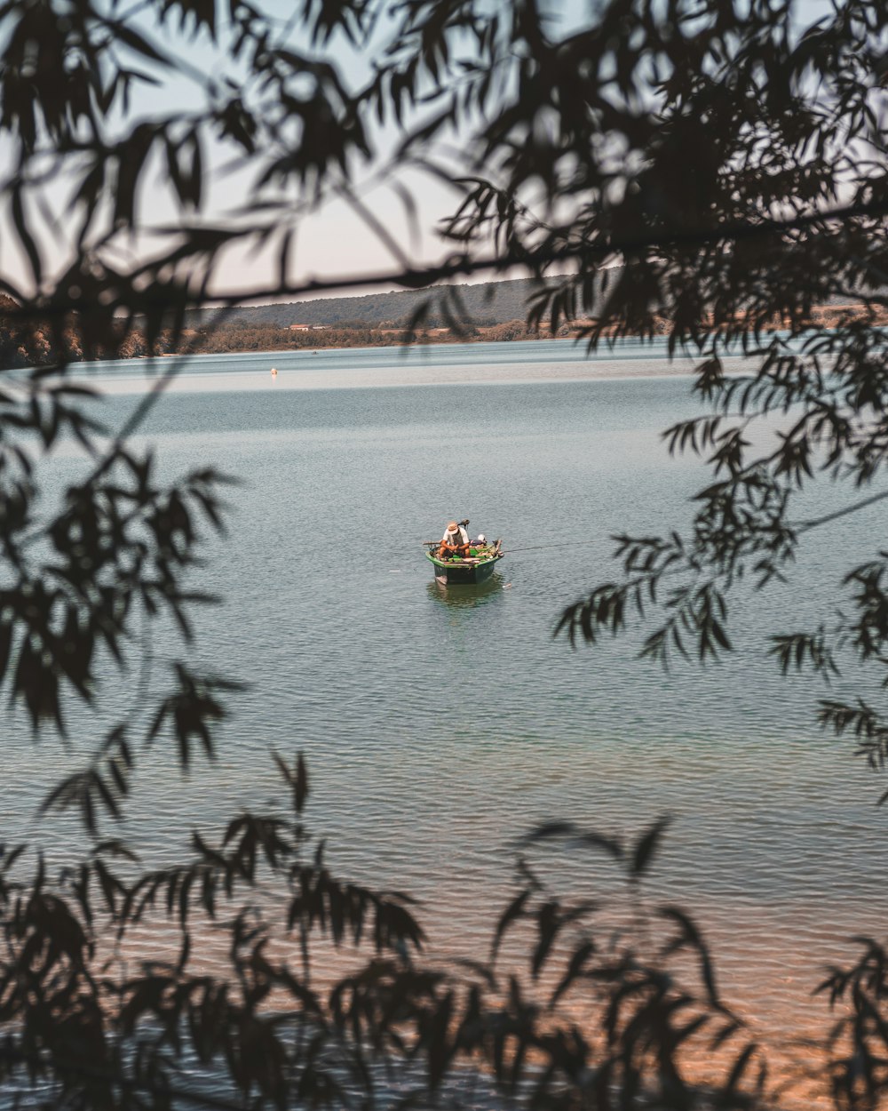 brown boat on body of water