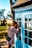woman peeking on glass door