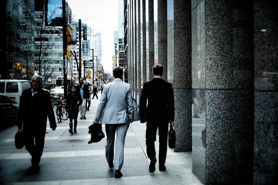 Business professionals walking through a city financial district