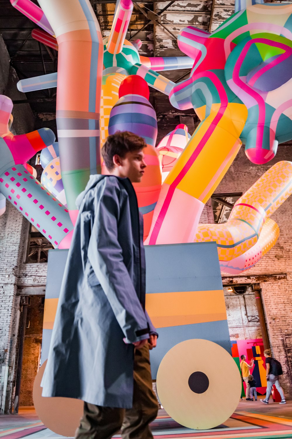 man standing near inflatable balloon