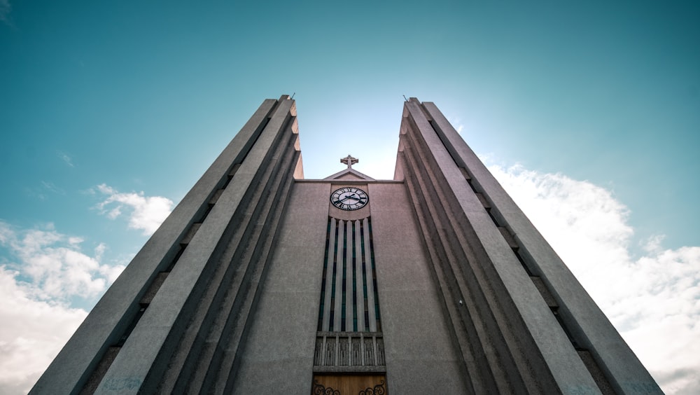 low angle photography of brown painted church