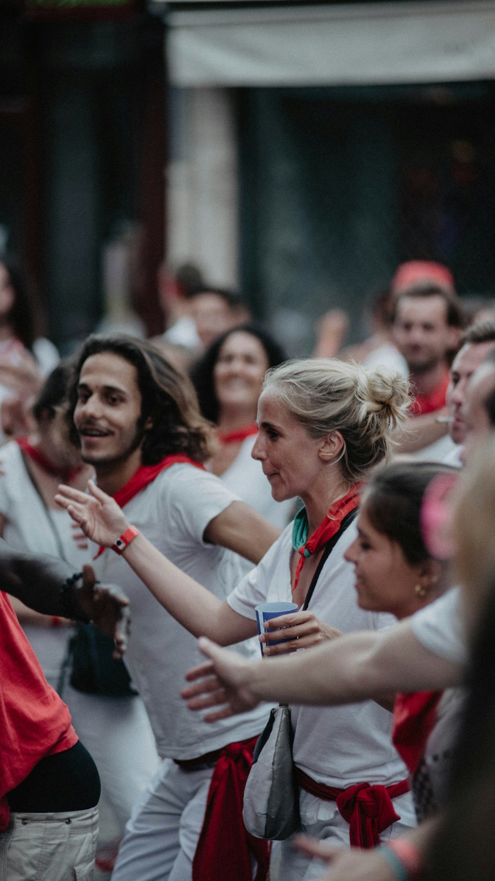 dancing people in shallow focus photography