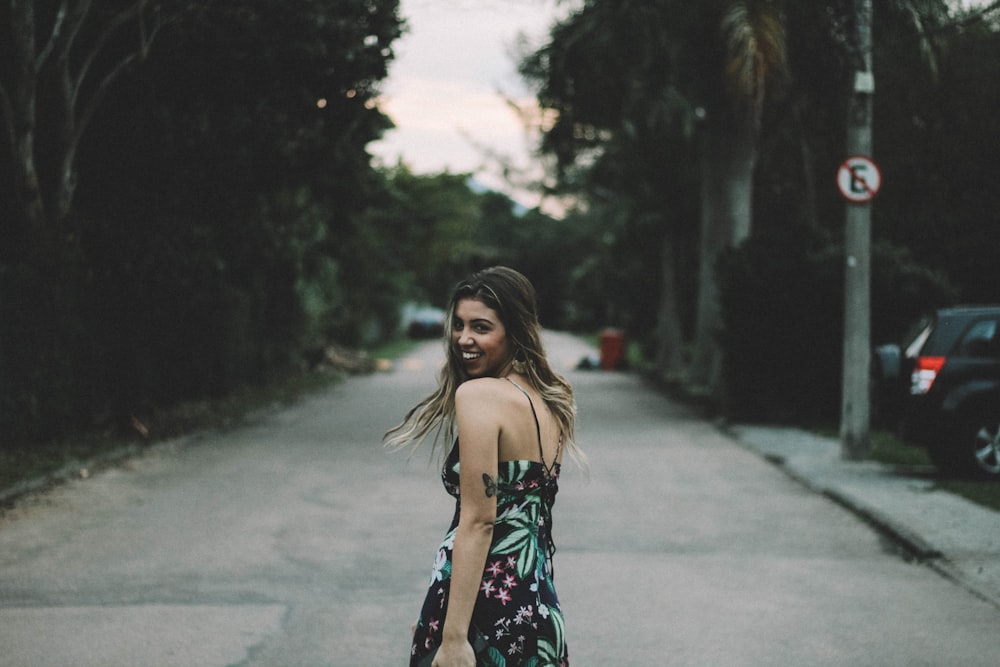 woman looking over shoulder